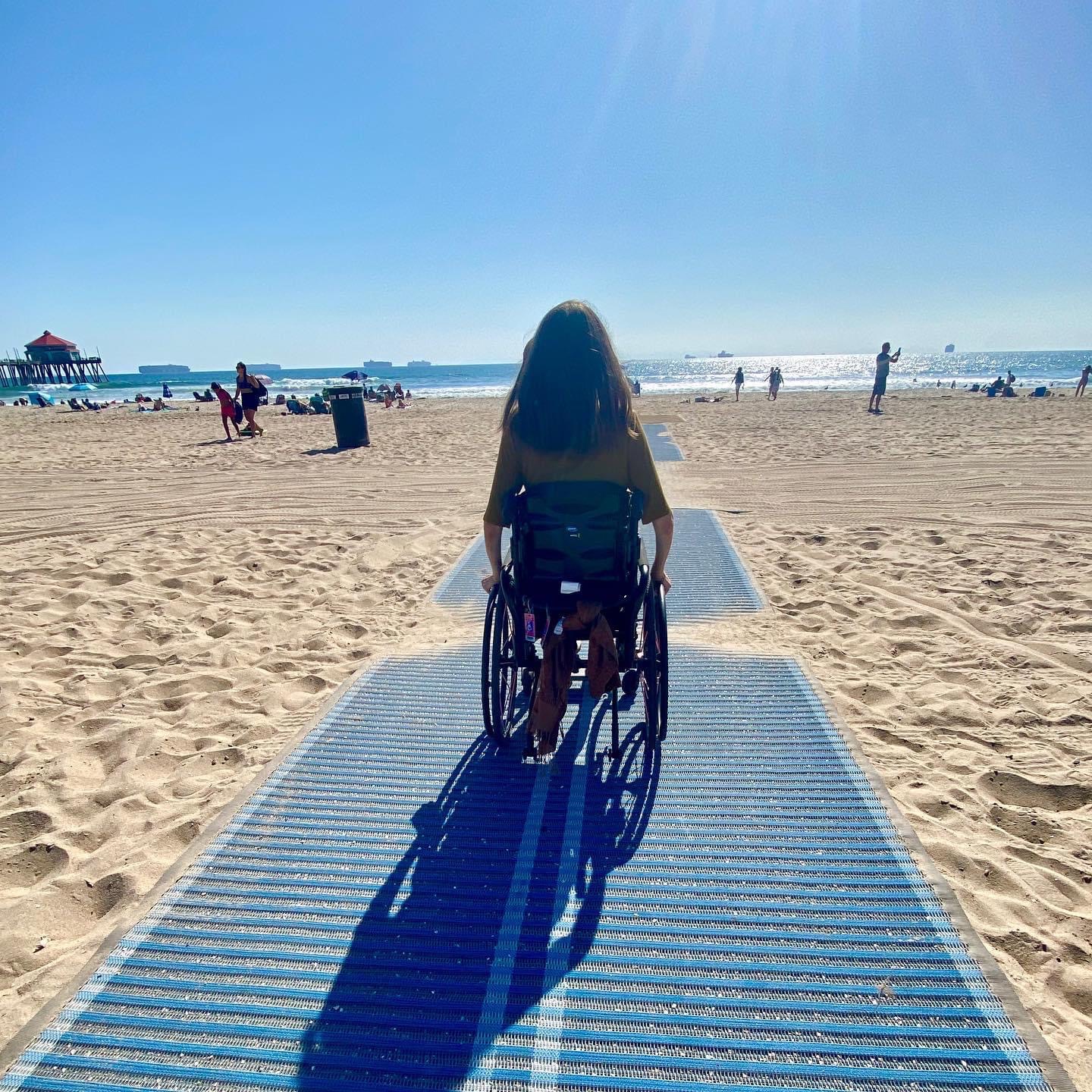 Abigail adaptive surfs in California